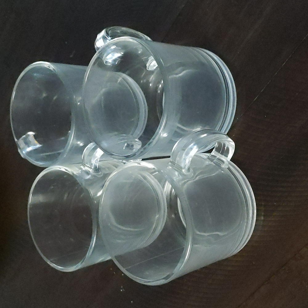 Four glass mugs
